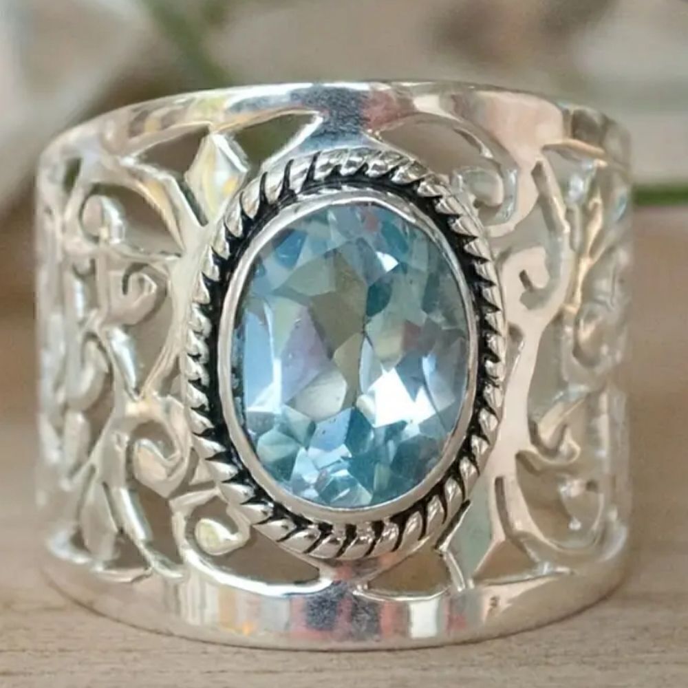 Ring band with ocean blue stone